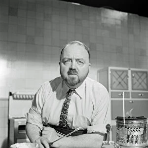 Philip Harben in his appearance in Meet Mr. Lucifer (1953)