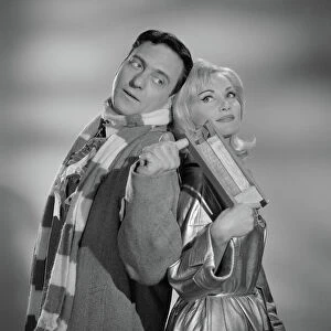 A publicity image from Rattle of a Simple Man (1964) taken on set at Elstree Studios