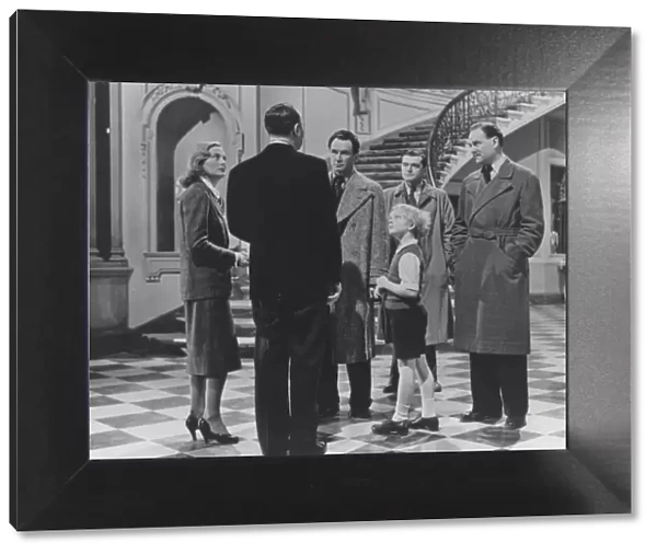 An interior group scene from The Fallen Idol (1948)