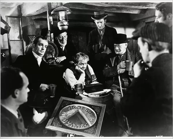 An interior group scene from The Last Days of Dolwyn (1949)