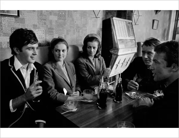 Jim Maclaine with a soft drink and friends