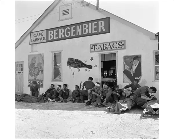 British troops at Dunkirk outside an abandoned cafe