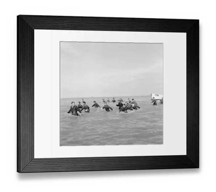 Framed Print : British troops walk into the water to try and board one of the small boats Framed Print : British troops walk into the water to try and board one of the small boats