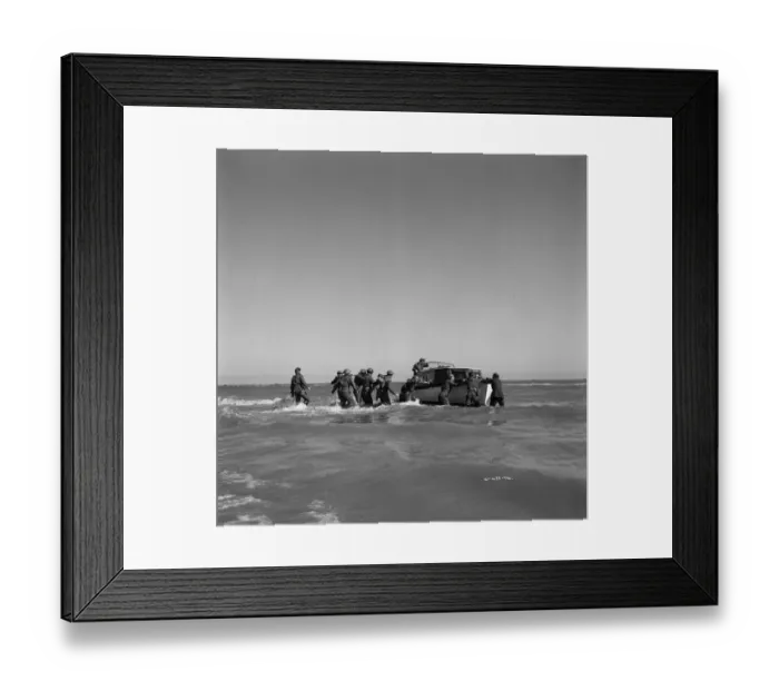 Framed Print : British soldiers try to board one of the small boats Framed Print : British soldiers try to board one of the small boats