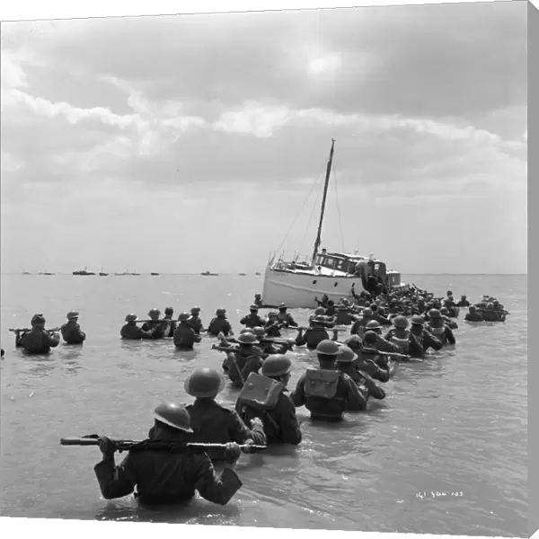 British soldiers try to board one of the small boats