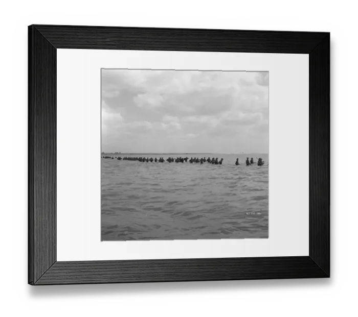 Framed Print : British soldiers try to board one of the small boats Framed Print : British soldiers try to board one of the small boats