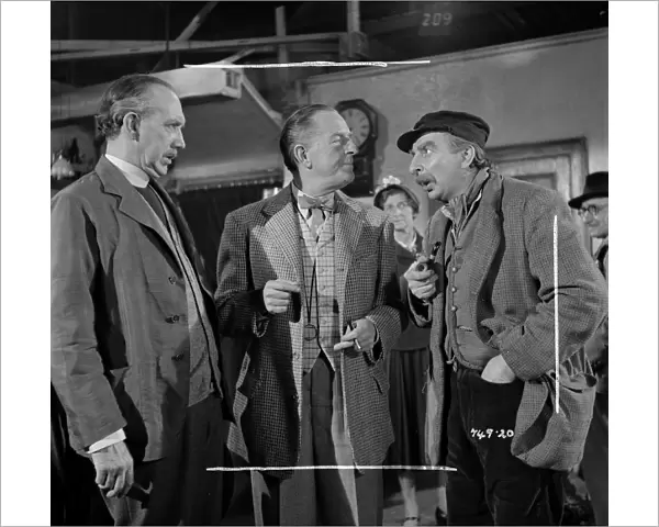 George Relph, Stanley Holloway and Hugh Griffith