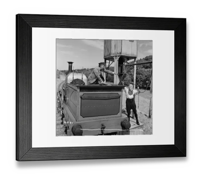 Framed Print : The bishop and Vicar refill the Thunderbolt with water Framed Print : The bishop and Vicar refill the Thunderbolt with water