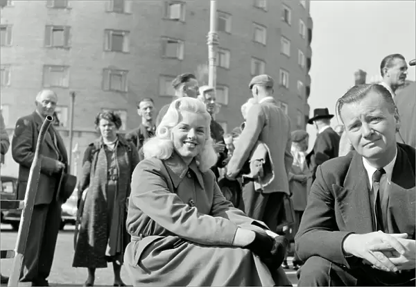 A smiling Diana Dors during filming of Yield to the Night