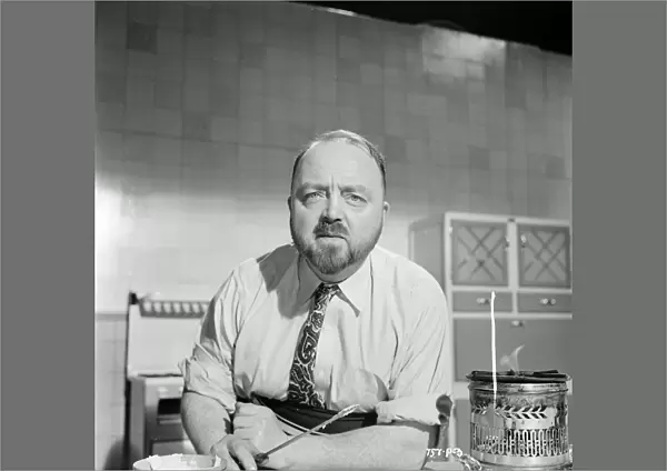 Philip Harben in his appearance in Meet Mr. Lucifer (1953)