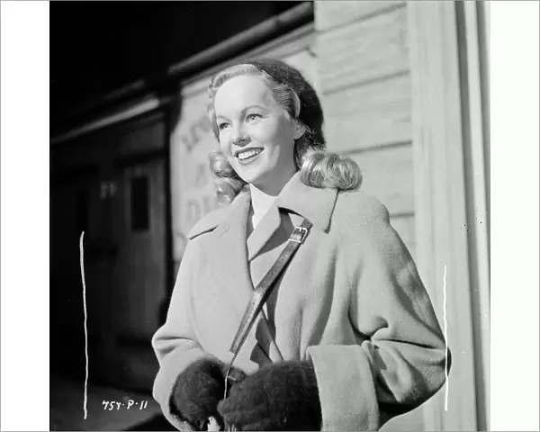 A smiling Peggy Cummins as Kitty in Meet Mr. Lucifer