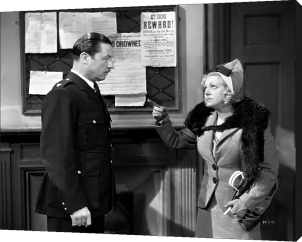 Ida Arnold confronts the police Inspector in Brighton Rock (1947)