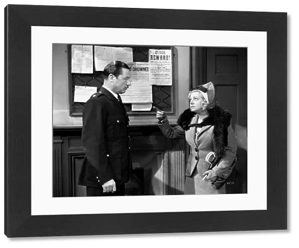Ida Arnold confronts the police Inspector in Brighton Rock (1947)