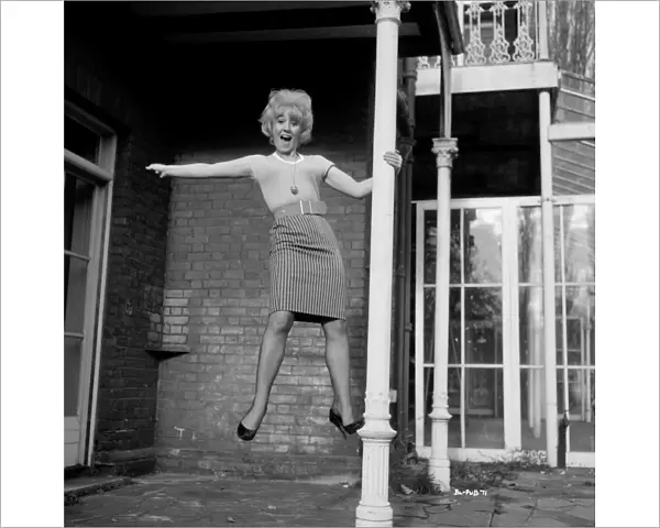 A playful portrait of Gwendolyn Watts for the promotion of Billy Liar (1963)