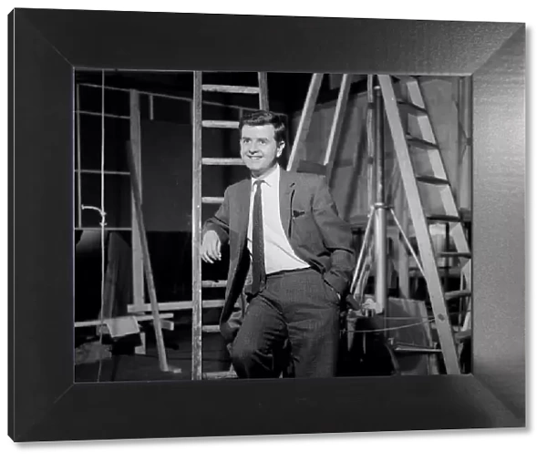 A smiling Rodney Bewes on the set of Billy Liar (1963)