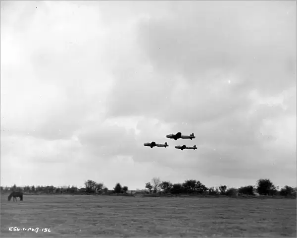 Three Lancaster bombers in formation