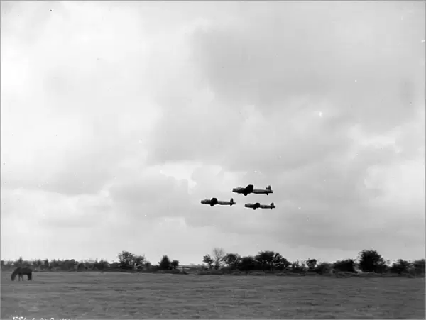 Three Lancaster bombers in formation