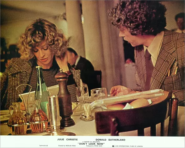 Julie Christie and Donald Sutherland in a front of the house image for Don t Look Now