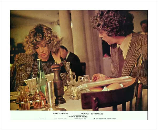 Julie Christie and Donald Sutherland in a front of the house image for Don t Look Now