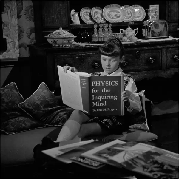 Susan reads Physics for the Inquiring Mind by Eric M. rogers