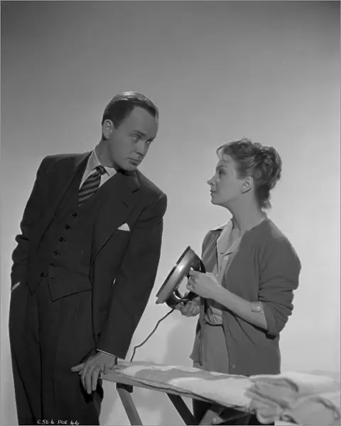 Derek Farr and Joan Greenwood pose in a publicity portrait for Young Wives Tale (1951)