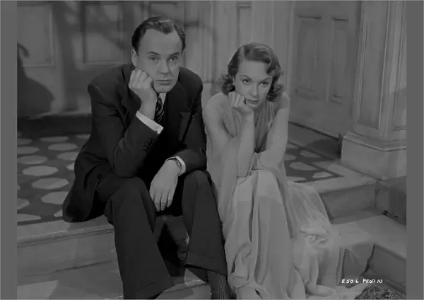 Thoughtful Derek Farr and Joan Greenwood in a scene from Young Wives Tale