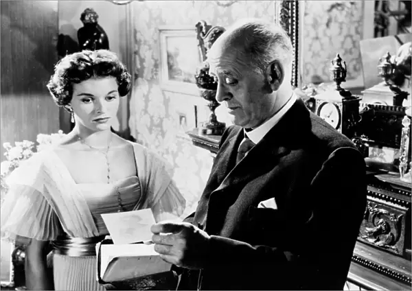 Alastair Sim and Eileen Moore in a scene from An Inspector Calls (1954)