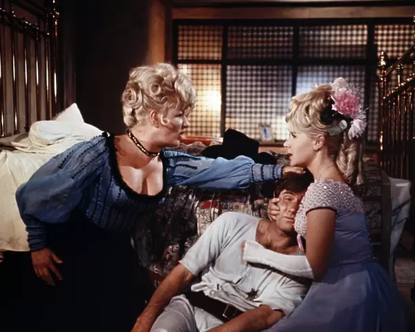Joan Sims, Jim Dale and Angela Douglas in a scene from Carry On Cowboy