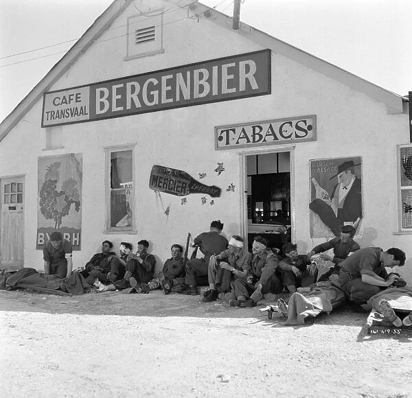 British troops at Dunkirk outside an abandoned cafe