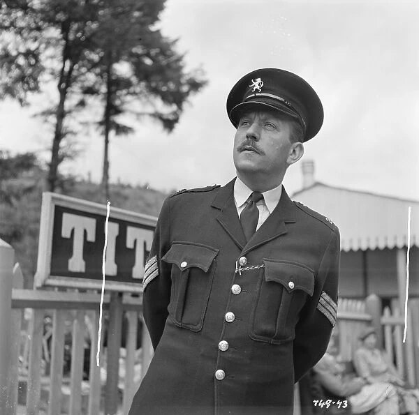 Campbell Singer. as the police sergeant in The Titfield Thunderbolt