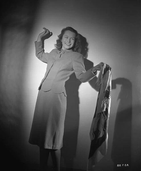 Carol Marsh smiles towards the camera in a promotional portrait for Brighton Rock (1947)