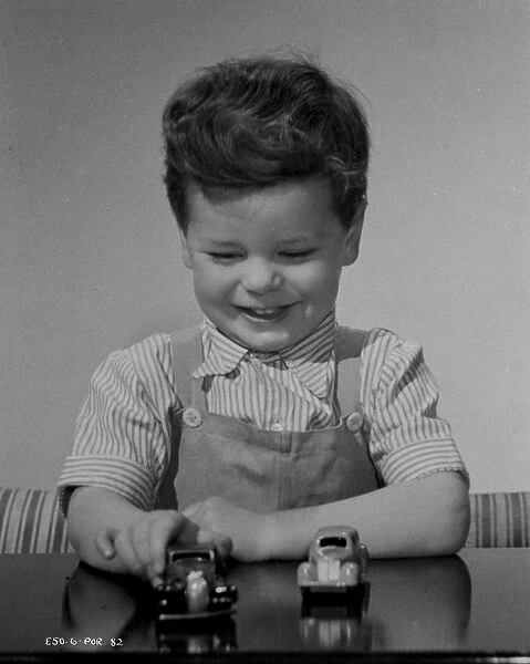 Child with Toy Cars publicity shot for Young Wives Tale