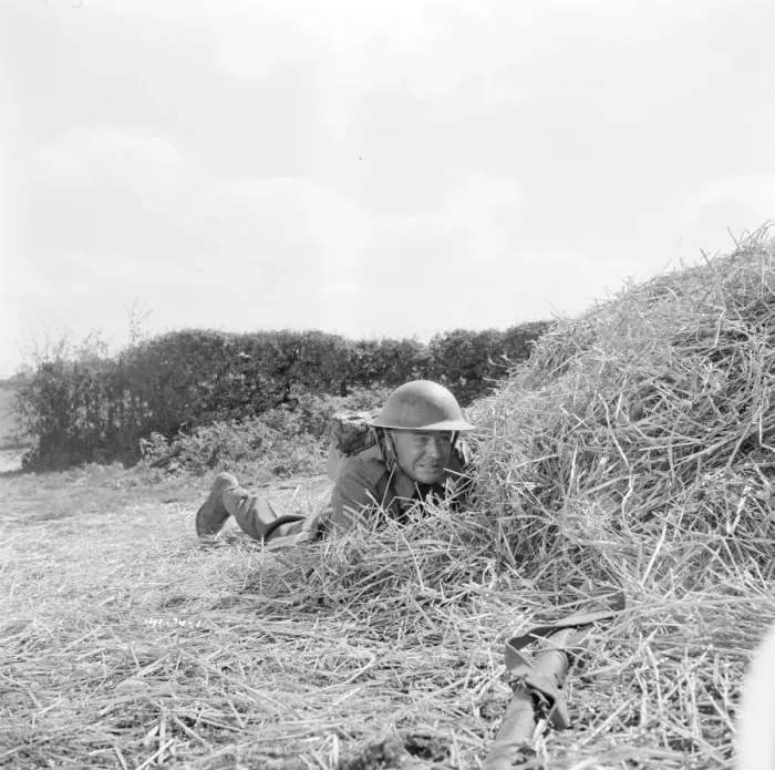 Framed Print : Corporal Tubby Bins hides behind a hay bale Framed Print : Corporal Tubby Bins hides behind a hay bale