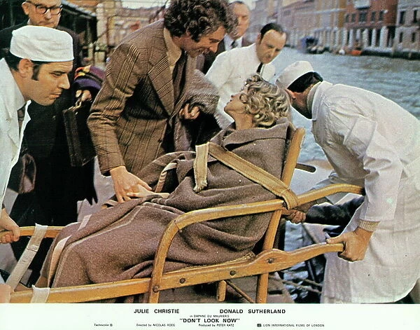 Donald Sutherland and Julie Christie in a lobby card for Don't Look Now (1973)
