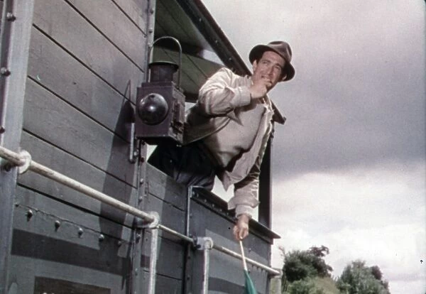 Gordon on the train. John Gregson in a scene from The Titfield Thunderbolt