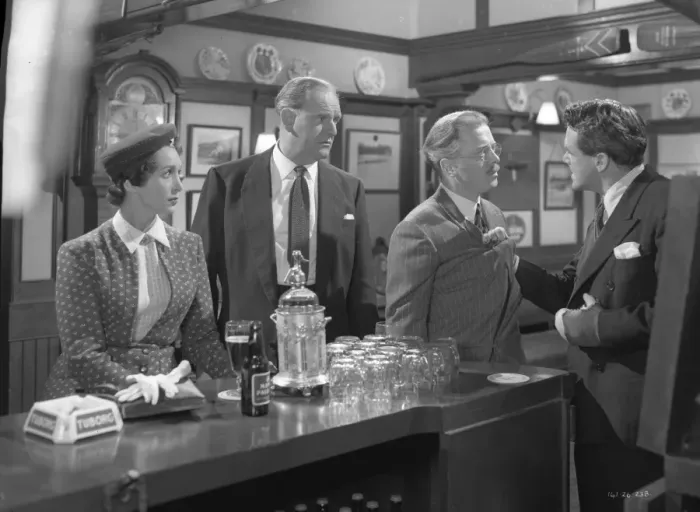 Framed Print : John Holden faces an angry Merchant Seaman in the local pub Framed Print : John Holden faces an angry Merchant Seaman in the local pub