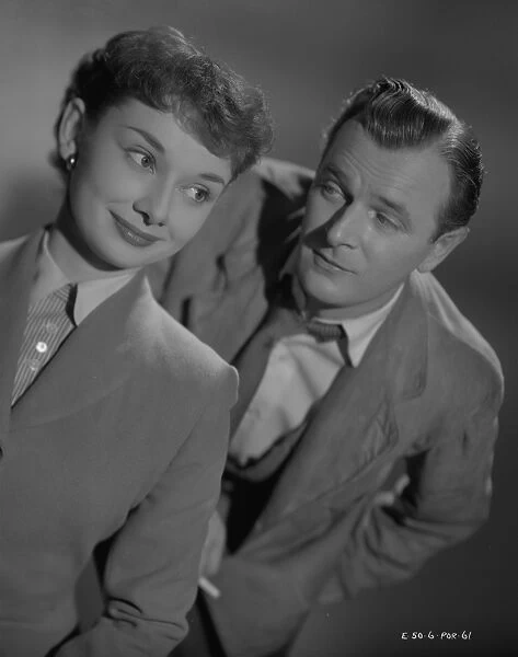 Nigel Patrick looks at Audrey Hepburn in a portrait for Young Wives Tale (1951)