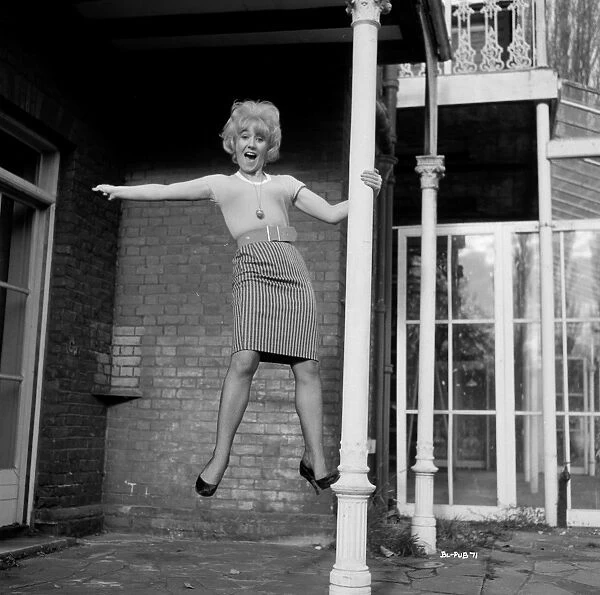 A playful portrait of Gwendolyn Watts for the promotion of Billy Liar (1963)