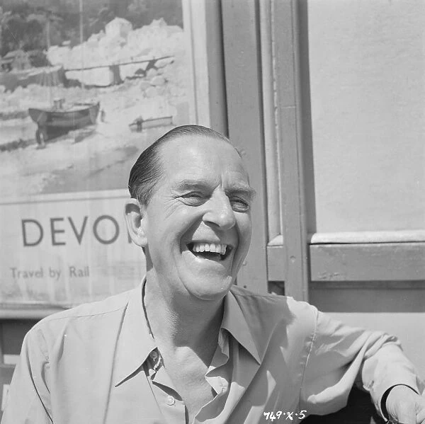 Stanley Holloway is having a laugh