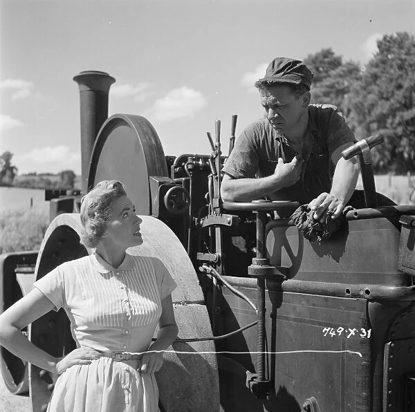 Who me?. Sid James and Gabrielle Brune on the set of The Titfield Thunderbolt