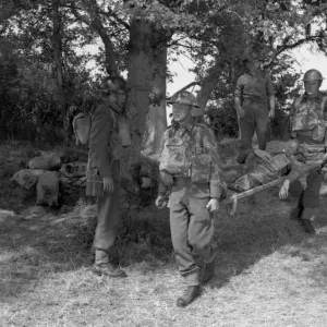 British soldiers around a wounded comrade