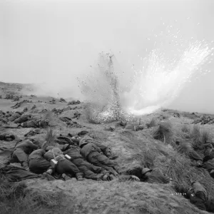 British troops under bombardment on the beach