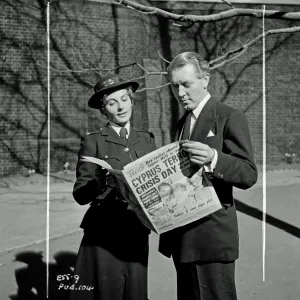 Checking the news on the set of Yield to the night