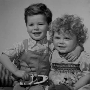 Children with toys publicity shot for Young Wives Tale