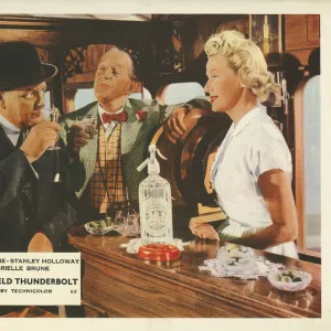 A colour lobby card for The Titfield Thunderbolt