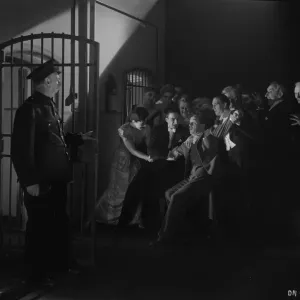 Black and White Print of a 1945 Film Scene Black and White Print of a 1945 Film Scene
