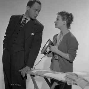 Derek Farr and Joan Greenwood pose in a publicity portrait for Young Wives Tale (1951)