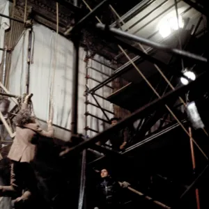 Donald Sutherland dangles from scaffolding in a scene of Don t Look Now (1973)