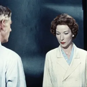 Dr. Decker and Margaret in the laboratory Dr. Decker and Margaret in the laboratory