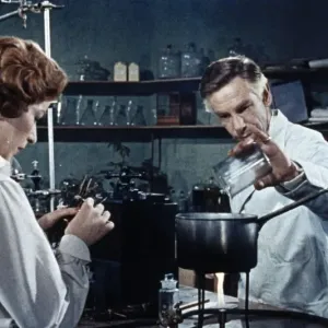 Dr. Decker and Margaret in the laboratory Dr. Decker and Margaret in the laboratory